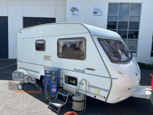 2002 Ace Award – 2 berth with motor movers, full end bathroom and 2 awnings